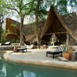 Enjoy a refreshing dip into the spacious pool.
