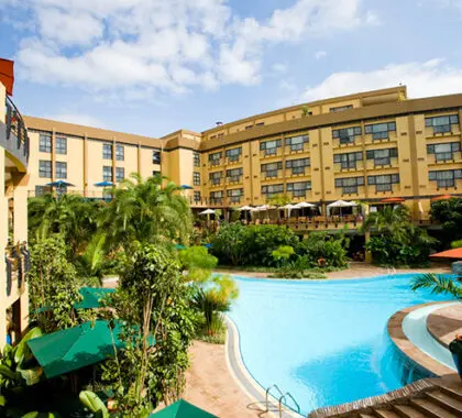Kigali Serena Hotel rooms overlook the large swimming pool.