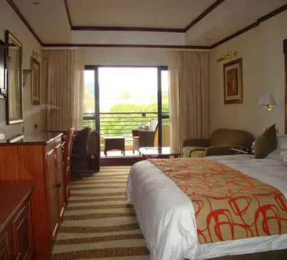 Step out onto your private balcony to enjoy the sun rise over Africa with a cup of fresh Rwandan coffee.