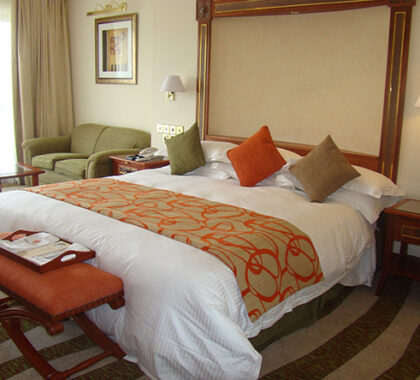 Your comfortable room welcomes you after a long flight or a morning spent in Kigali's markets.