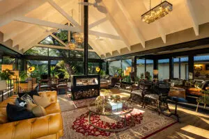 The lounge and bar, with a central fireplace to keep cosy during the colder evenings and mornings.