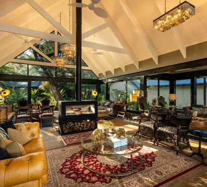 The lounge and bar, with a central fireplace to keep cosy during the colder evenings and mornings.