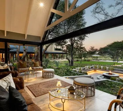 The bar and lounge verandah overlooks the firepit and waterhole beyond. 
