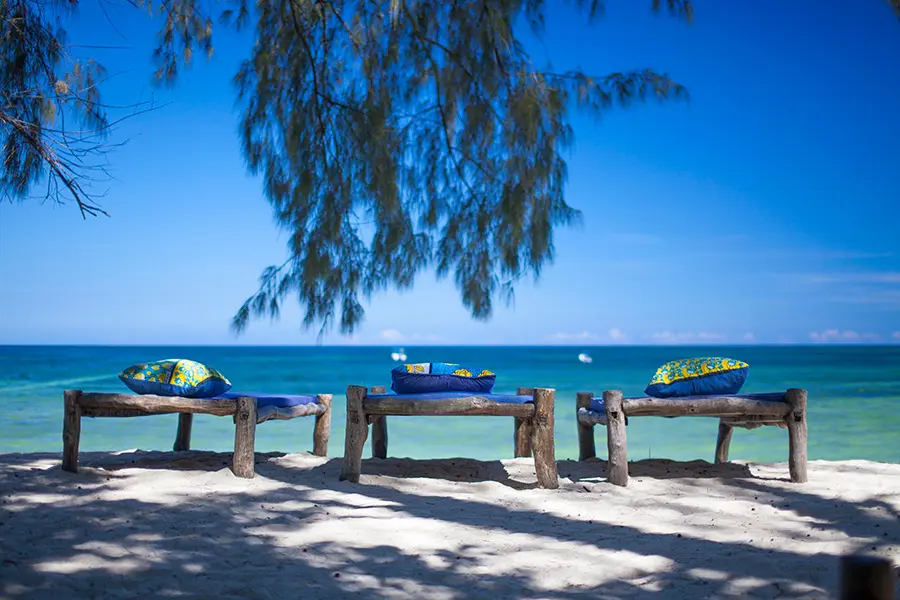 Spend lazy afternoons on the beach loungers.