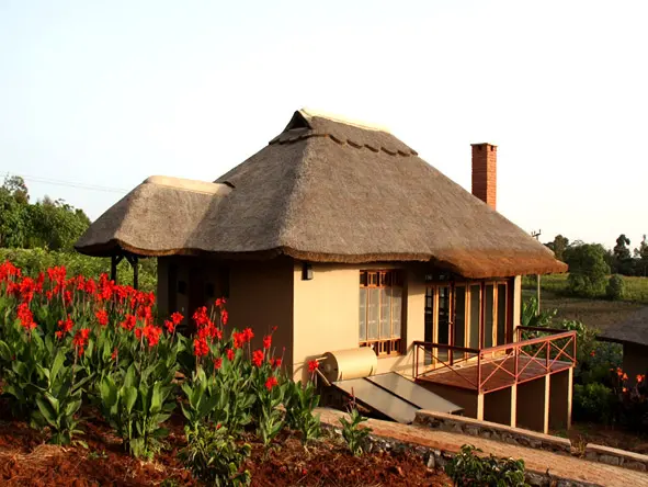 Each luxurious cottage is situated in a landscaped tropical garden offering stunning views of the area.