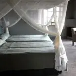 Mosquito nets cover the beds to add a wonderful romantic atmospheric touch.