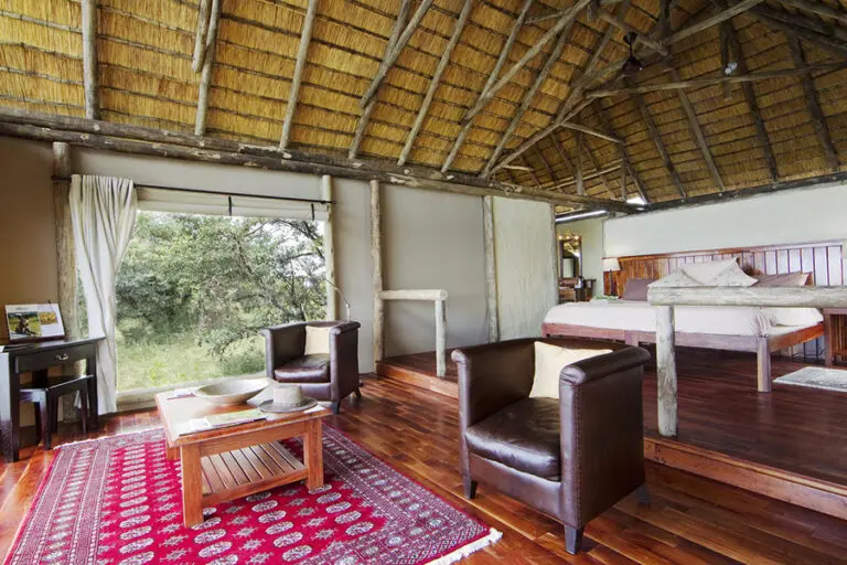 KwandoLagoonCamp-UpperLevelBedroom-Lounge