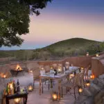 Enjoy delicious family dishes or local specialities in the boma under the beautiful African sky.