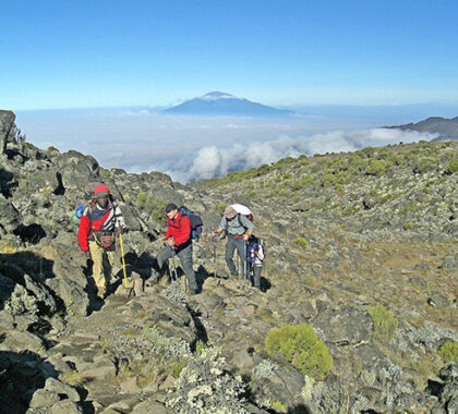 As you climb towards Uhuru Peak, you'll gradually move above the cloud line - quite an amazing feeling.