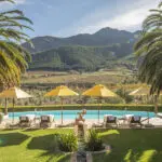Spend warm sunny days poolside looking out over the winelands mountains