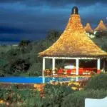 Relax on the poolside and enjoy an incredible view.
