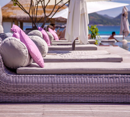 Relax on the cushioned loungers, taking in the views, sea breeze and sunshine.