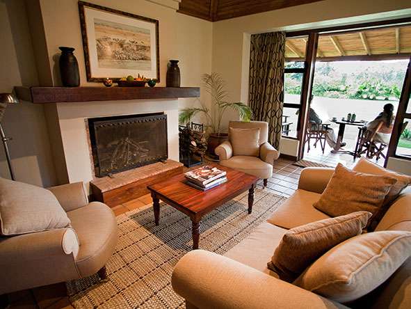 The cottages all feature a comfortable lounge, complete with sofas & fireplace.
