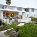 The lodge is stylish and modern, with a cascading rock garden filled with indigenous plants and flowers.