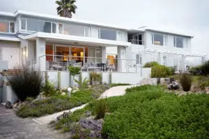 The lodge is stylish and modern, with a cascading rock garden filled with indigenous plants and flowers.