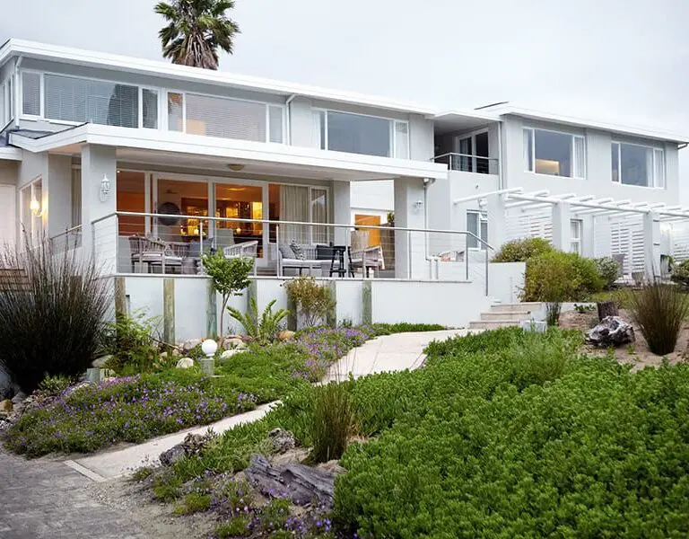 The lodge is stylish and modern, with a cascading rock garden filled with indigenous plants and flowers.