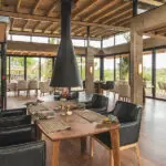 Enjoy exquisite dining, warm and cosy by the indoor fireplace, or outdoors on the deck. 