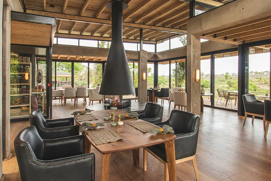 Enjoy exquisite dining, warm and cosy by the indoor fireplace, or outdoors on the deck. 