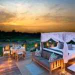 De Lion Sands boomhutten hebben een prachtig uitzicht op de zonsondergang, maar wacht maar tot de sterren tevoorschijn komen!