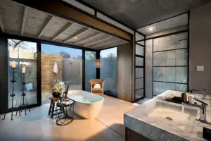 En suite bathrooms have indoor and outdoor showers.