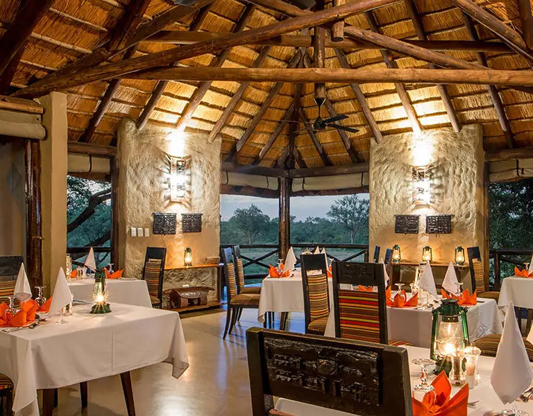 Dine in style in the dining area or out under the African night sky, enjoying some amazing South African wine.