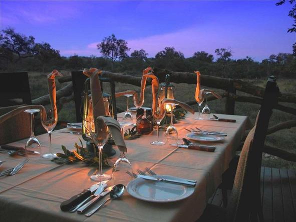 Dine in style under the African night sky, enjoying some amazing South African wine.
