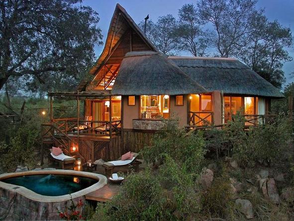 The lodge is constructed and decorated in a classic safari style.
