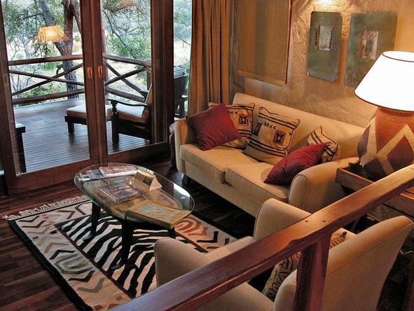 The suites at Lukimbi have a spacious lounge area and outdoor deck.
