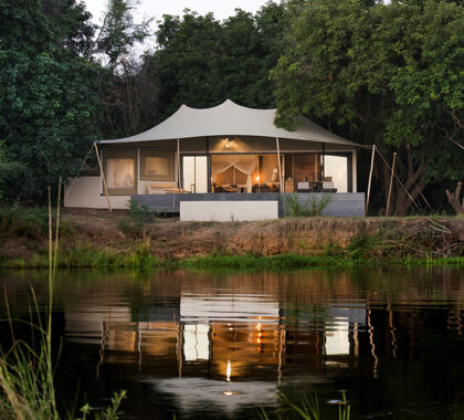 Set on a quiet stretch of the Lower Zambezi with view of the mountains.