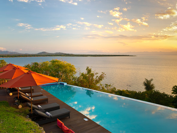 Enjoy a classic African sunset from the comfort of Pumulani's pool deck.