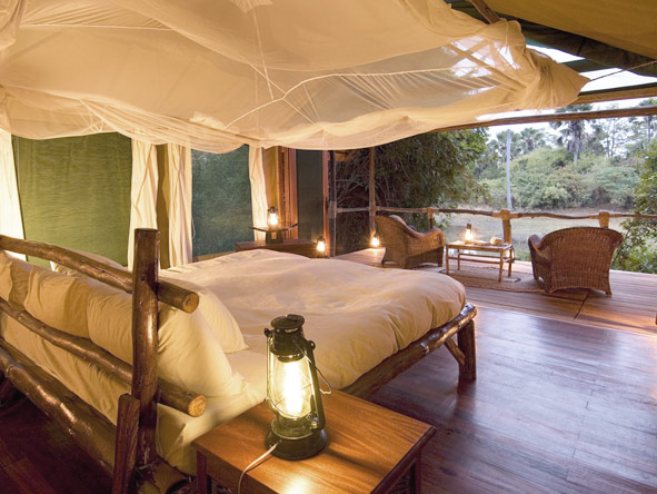 Each of Mvuu's eight tented suites overlooks a plam-fringed lagoon - keep your binoculars handy!