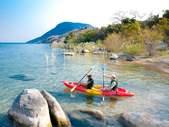 The crystal-clear waters of Lake Malawi make a kayak trip simply irresistible.