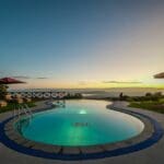 The swimming pool at Lake Nakuru Sopa Lodge overlooks the vast lake below.