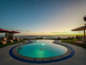 The swimming pool at Lake Nakuru Sopa Lodge overlooks the vast lake below.
