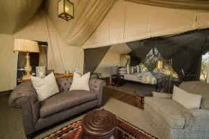 Netted bedroom suite and lounge.