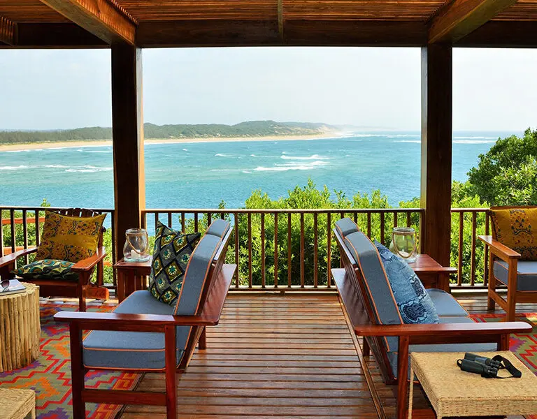 Sip on a cocktail or enjoy a freshly prepared light meal in the lounge area or on the deck while marveling at the view.