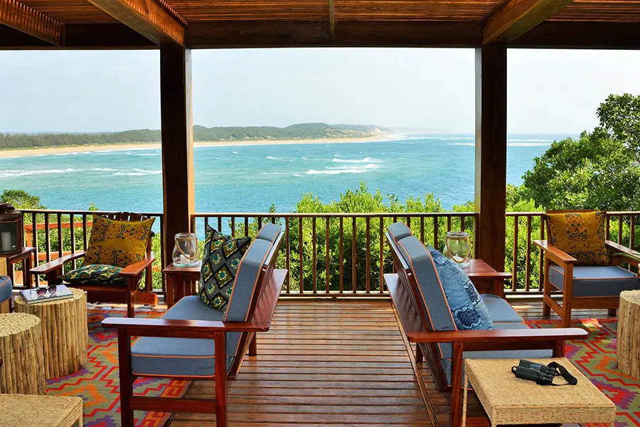Sip on a cocktail or enjoy a freshly prepared light meal in the lounge area or on the deck while marveling at the view.