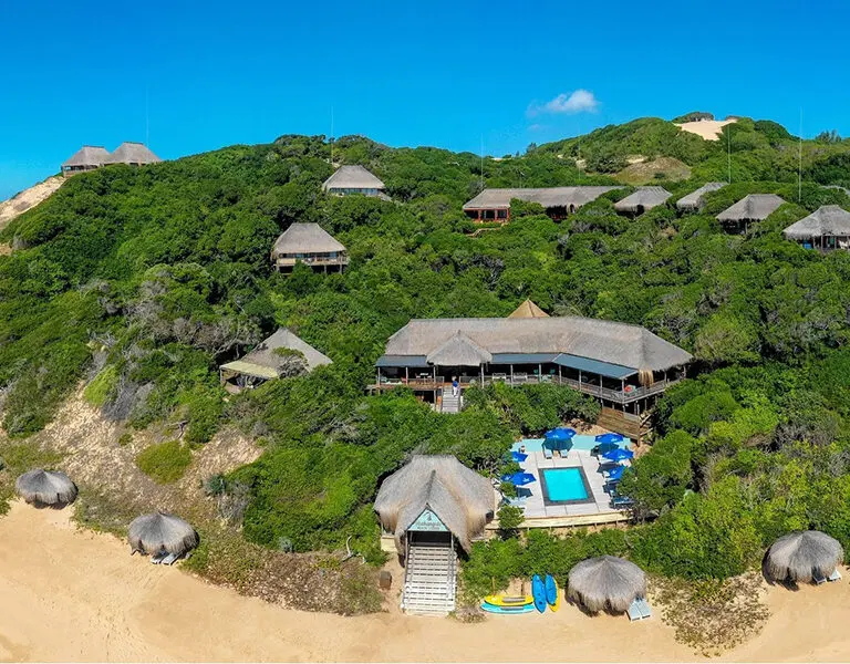 Machangulo Beach Lodge is situated amongst the white-sand dunes of southern Mozambique, close to Maputo.