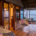 The luxury beach villas are just a few feet from the ocean and feature their own veranda and plunge pools.