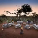 Enjoy dinner under the African sky.