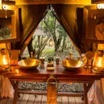 Your private suites bathroom has canvas tents that may be opened, giving off the impression that you're outside!