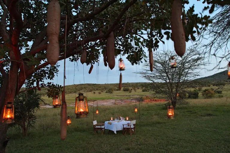 Private dinner surrounded by lanterns. 