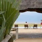 The swimming pool deck looks out over to Lake Manyara. 