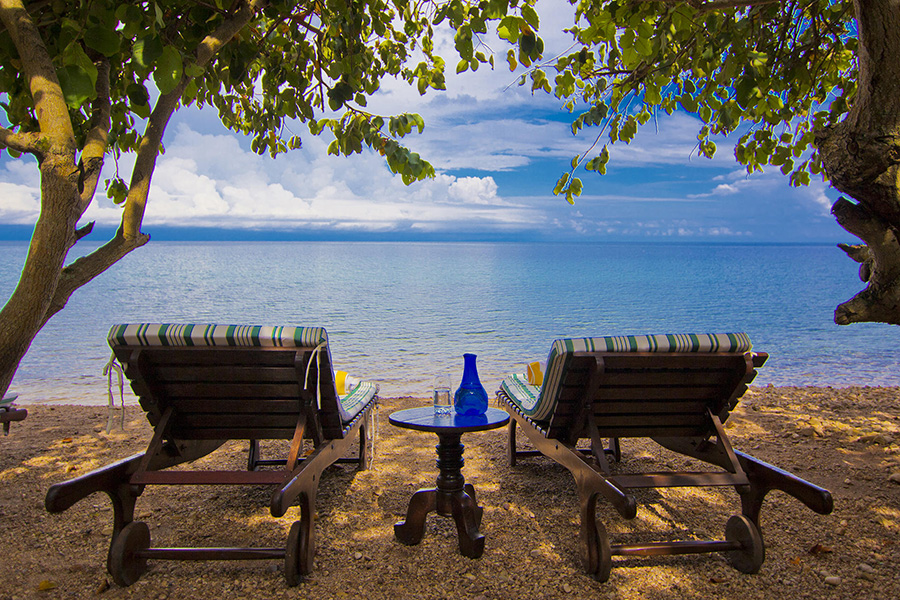 Shaded sun loungers make the ideal place to spend an afternoon after a morning trek through the forest.