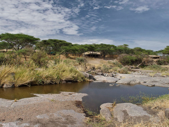 This camp is strategically positioned at the point where the river leaves the Serengeti National Park.
