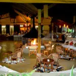 The camp's open-plan lounge is a popular place for guests to meet & swap safari stories.