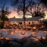 Meals are served in the covered dining room or boma area at Khwai Tented Camp in Botswana.