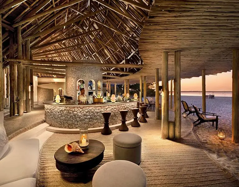 The main guest area includes a bar, dining areas and indoor and outdoor lounges. 