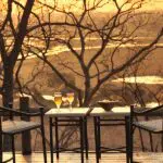 Meals at Muchenje are served against the backdrop of the Chobe River.
