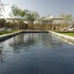 Cool off in the inviting swimming pool.
